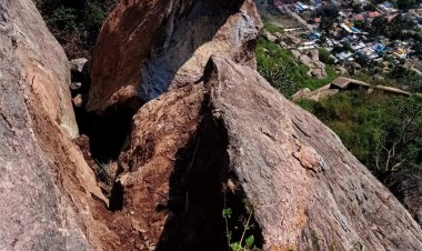 இடியுடன் கூடிய கனமழை பெய்ததால் பாறை வெடித்தது